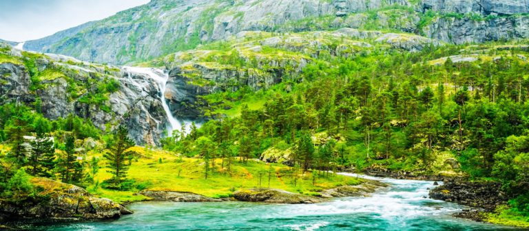Giant Waterfall in the Valley of waterfalls in Norway.