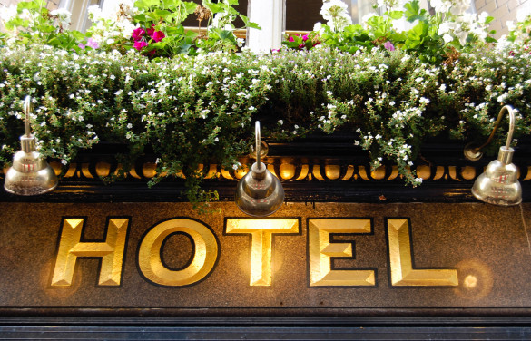 golden-hotel-sign-close-up-shutterstock_219379825-2-585x376