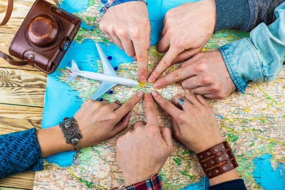 six-cool-friends-are-planning-euro-trip-shutterstock_354213974-2-585x390