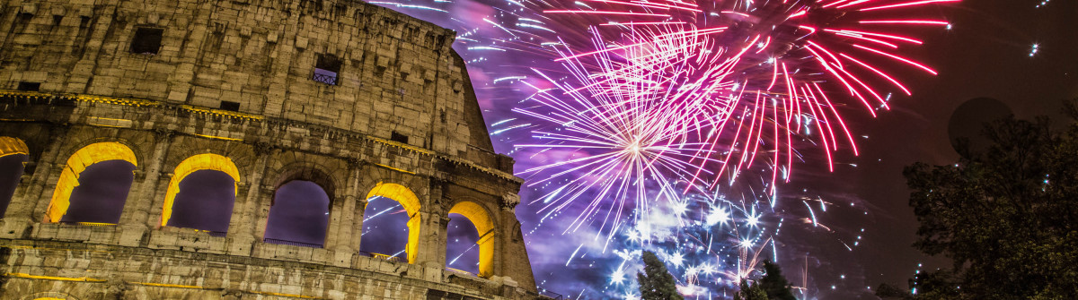 New Year’s fireworks in the sky by the Colosseum in Rome