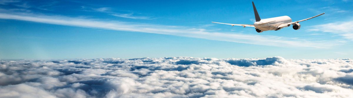 commercial-airplane-plane-flying-on-the-clouds-iStock_70565965_XLARGE-2