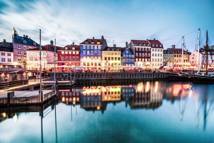 View of Copenhagen famous canal with boats and houses