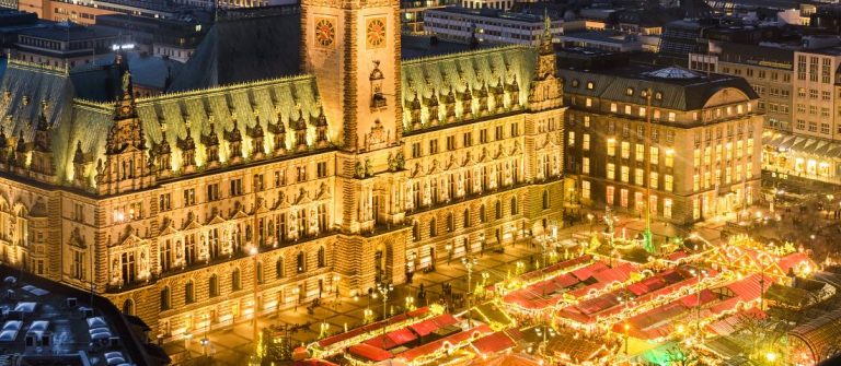 shutterstock_344432855_Aerial-view-of-the-City-Hall-with-the-Christmas-market-in-Hamburg-Germany_header