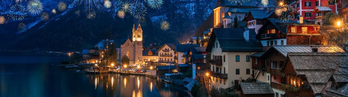 Hallstatt-in-Austria-celebrating-New-Years-Eve-with-flashing-colorful-fireworks-shutterstock_1214832397
